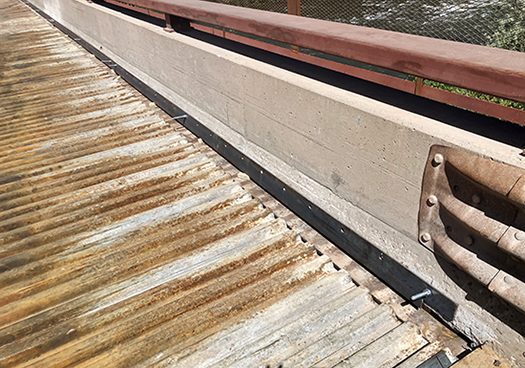Steel plates have been attached to the north side curb of the County Road 108 Bridge near Carbondale. 