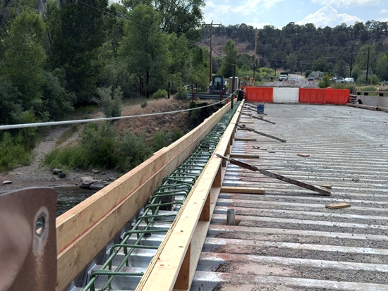 Forms are finished and rebar installed for concrete curb to be poured
